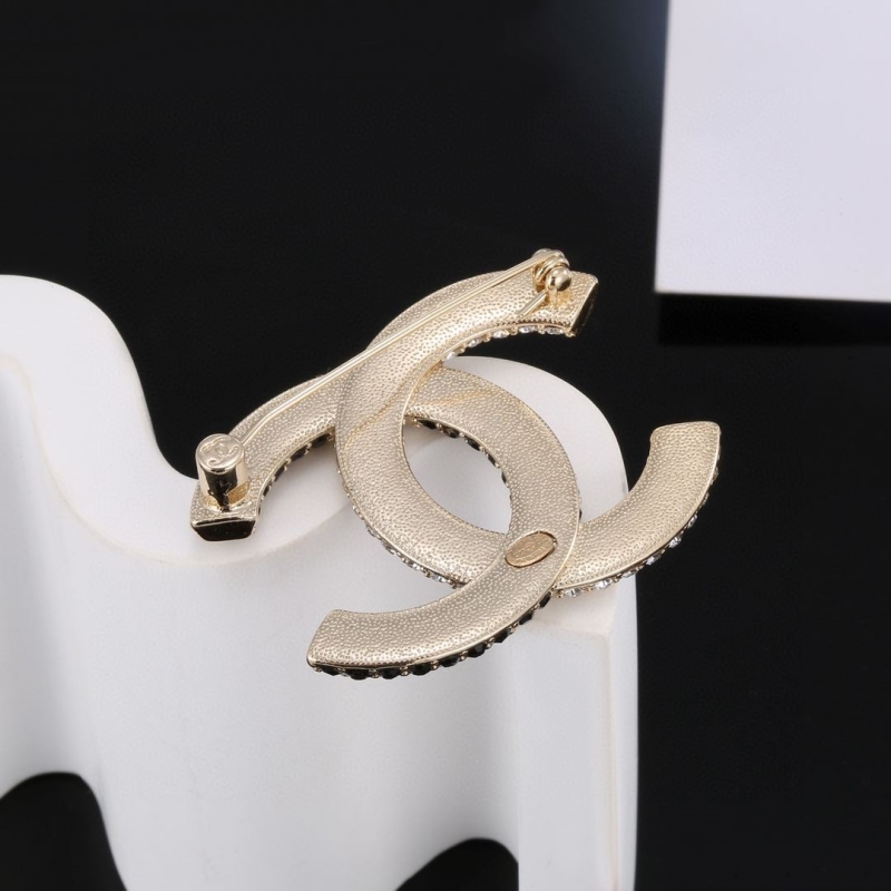 Ch**el brooches